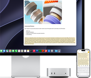 Widok z przodu na Maca mini schowanego pod monitorem Studio Display, po prawej stronie urządzenia i monitora znajduje się iPhone; na iPhonie widać zaznaczony tekst z poleceniami wcięcia, kopiowania, wklejania i automatycznego wstawiania powyżej, który odpowiada wyróżnionemu tekstowi na wyświetlaczu, co demonstruje działanie Uniwersalnego schowka