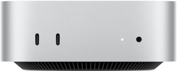 Mac mini, przód, dwa porty Thunderbolt, dioda statusu i gniazdo słuchawkowe, czarna, zwężana podstawa u dołu, płaski wierzch, zaokrąglone rogi, proste krawędzie, kolor srebrny